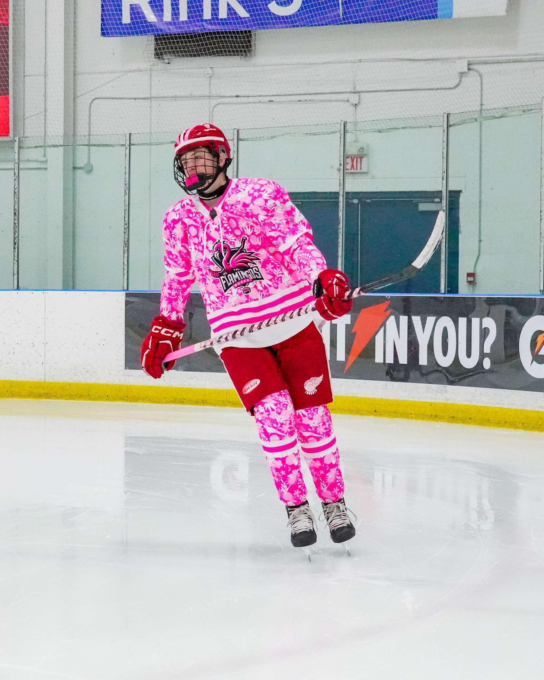 Skater racing down the ice